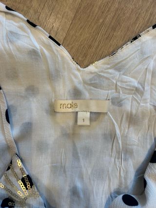 Top blanco con lunares y lentejuelas