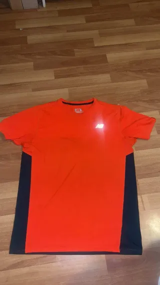 Camiseta deportiva New Balance NB DRY azul