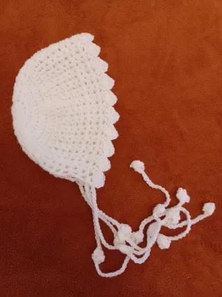 Capota de bebé tejida a mano