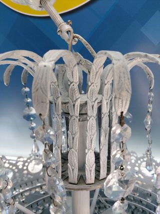 Antigua lámpara de techo estilo Imperio. Araña de cristales de roca.