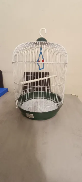 Jaula para pájaros blanca y verde