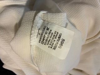 Top donna con bottoncini schiena