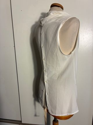 Top donna con bottoncini schiena