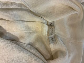 Top donna con bottoncini schiena