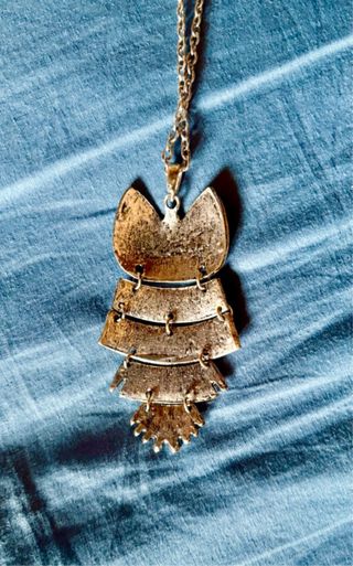 Colgante de búho blanco y marrón