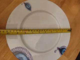 Conjunto de 21 platos de porcelana