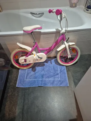 Bicicleta infantil rosa con cesta Patrulla Canina