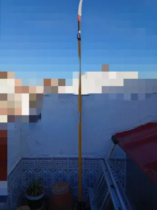 Sierra telescópica manual