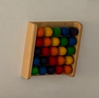 Juego madera estimulación Fridlin