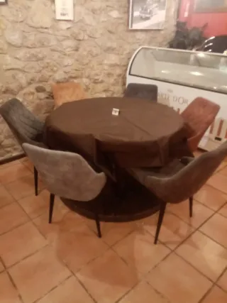 Mesa redonda de comedor con 6 sillas