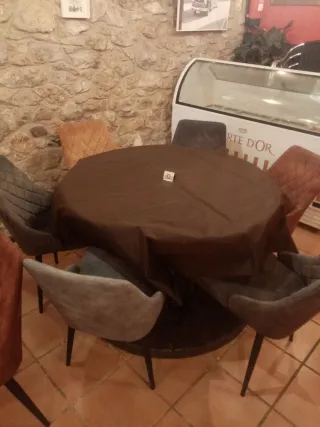 Mesa redonda de comedor con 6 sillas