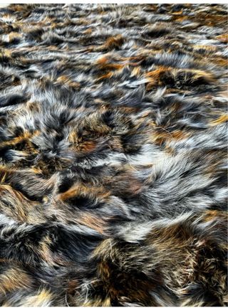 Coperta in pelliccia naturale di procione