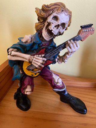 Figura esqueleto rockero guitarra decorativa