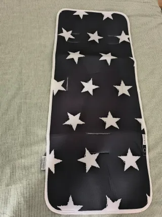 Colchoneta para cochecito con estrellas