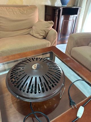 Estufa eléctrica redonda marrón