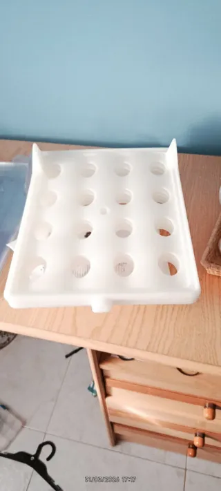 Separador de camisas dobladas