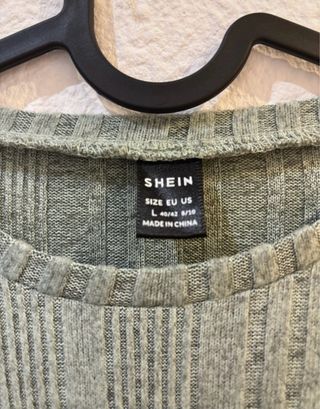 Suéter de punto verde