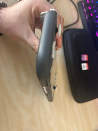 Nintendo Switch Lite + Funda + Cargador + 2 juegos