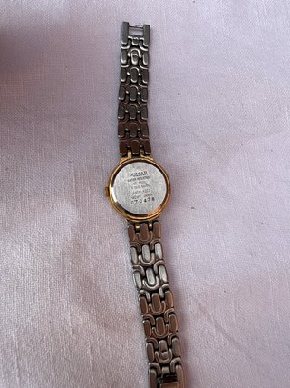 Reloj Pulsar Bicolor Oro y Plata