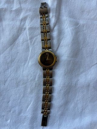 Reloj Peugeot Oro y Plata