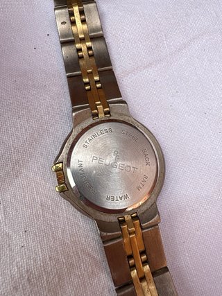 Reloj Peugeot Oro y Plata