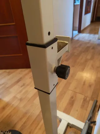 Soportes y barra larga para pesas