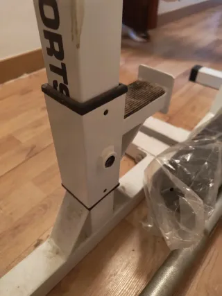 Soportes y barra larga para pesas