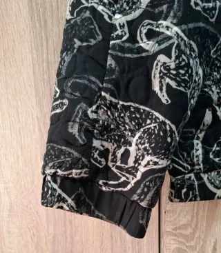 Cazadora negra H&M estampado Jaguares XL