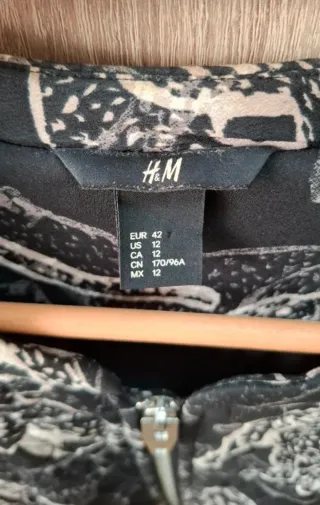 Cazadora negra H&M estampado Jaguares XL