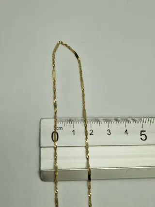 Cadena de oro 18kt.