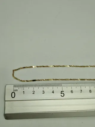 Cadena de oro 18kt.