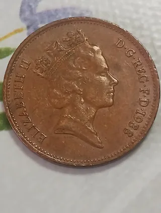 Monedas 2 y 5 peniques Reino Unido
