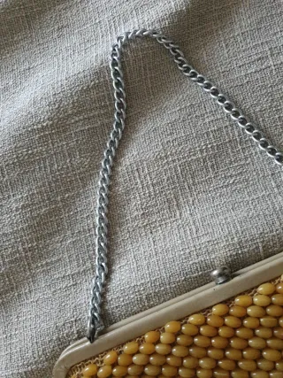 Bolso vintage dorado con cadena