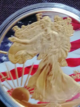 Moneda Libertad Americana y Cortador espuma
