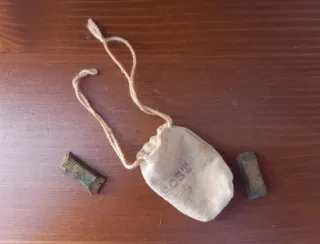 Bolsa de tela con 2 Lingotes oro Madelman sheriff.