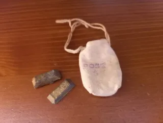 Bolsa de tela con 2 Lingotes oro Madelman sheriff.