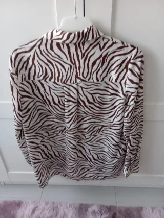 Blusa  Animal Print talla S.