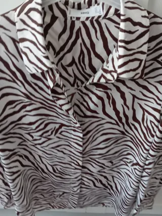 Blusa  Animal Print talla S.