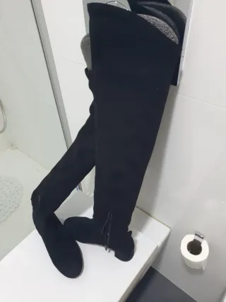 Botas altas ante negras