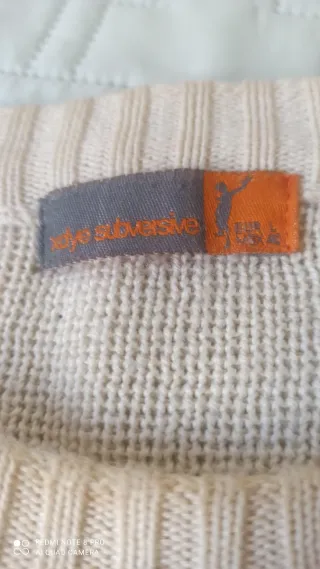 Jersey de punto beige y naranja