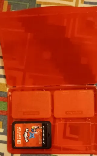 Nintendo Switch Lite + Custodia Super Mario + 2 Gi