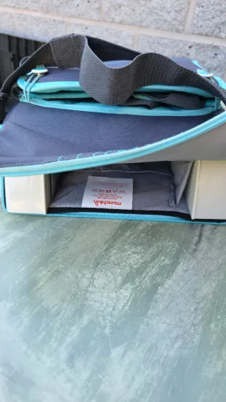 Trona Munchkin Portátil