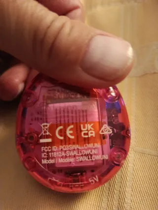 Tamagotchi Uni consola para niños con funda/correa