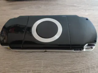 PSP Slim con caricatore