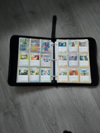 Álbum Pokémon 1080 bolsillos + 135 cartas