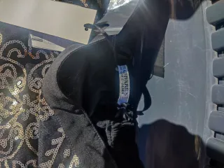 Minifalda negra con lentejuelas doradas Talla S