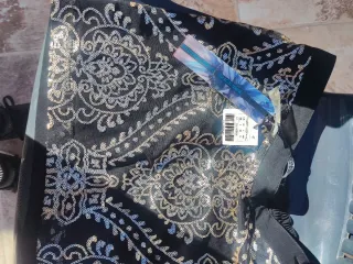 Minifalda negra con lentejuelas doradas Talla S