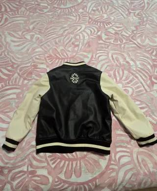 Chaqueta Zara niño negra y beige