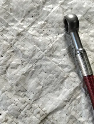 Latiguillo metálico moto