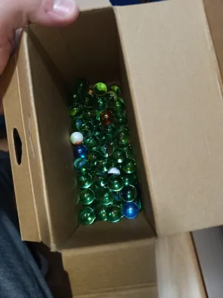 Lote de canicas de cristal verdes